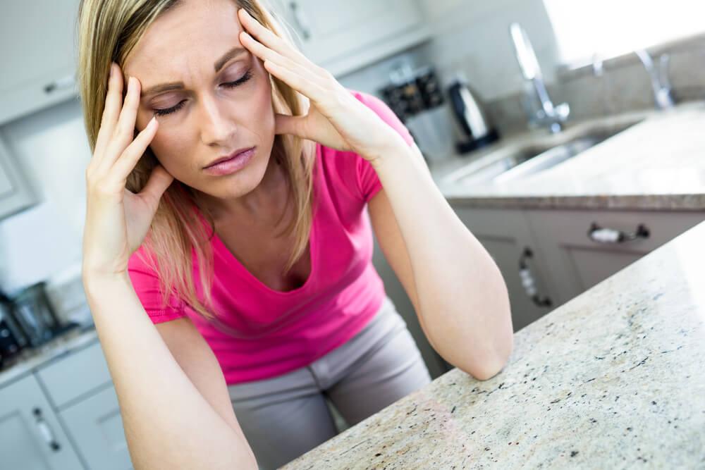 Caregiver burnout can be indicated by exhaustion and physical pain.